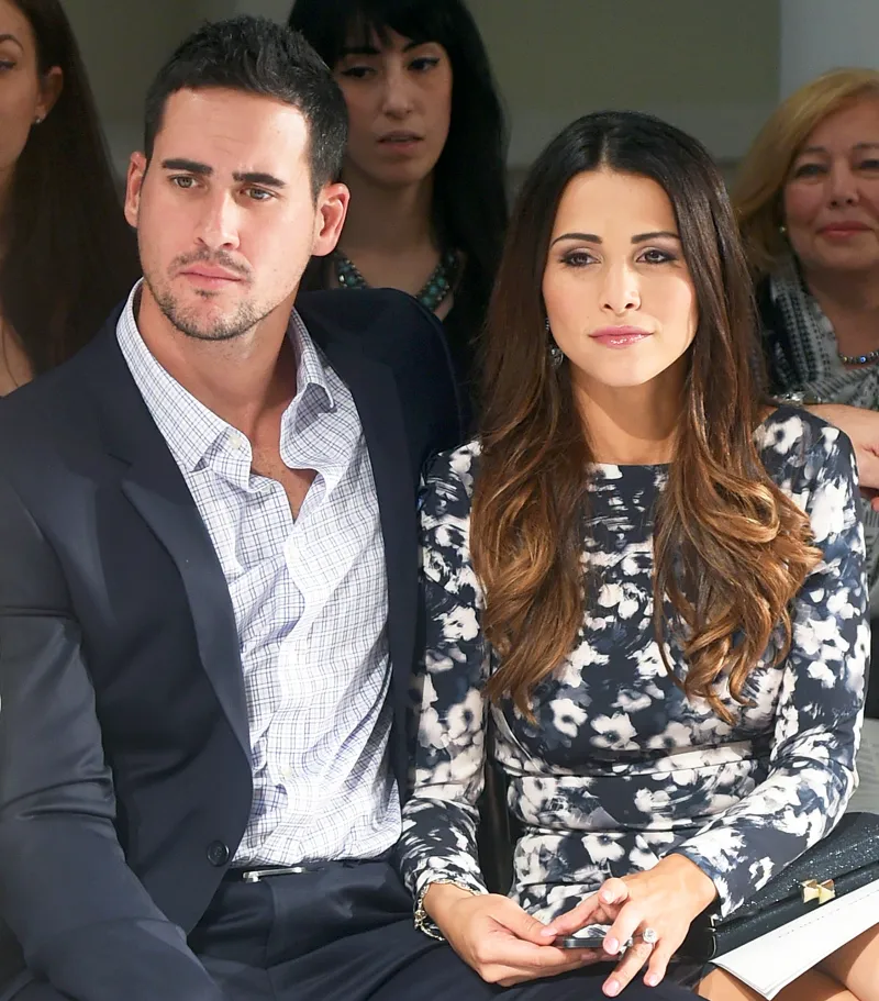Josh Murray and Andi Dorfman attend front row at The Mark Zunino For Kleinfeld 2015 Runway Show at Kleinfeld in New York City.