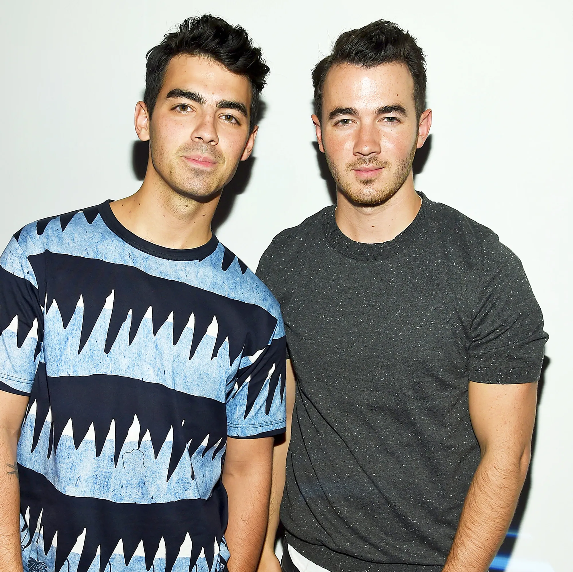 Joe Jonas and Kevin Jonas attend JCPenney launch of Collection by Michael Strahan in New York City.