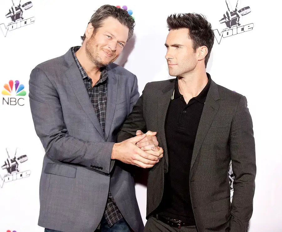 blake-shelton-adam-levine-holding-hand