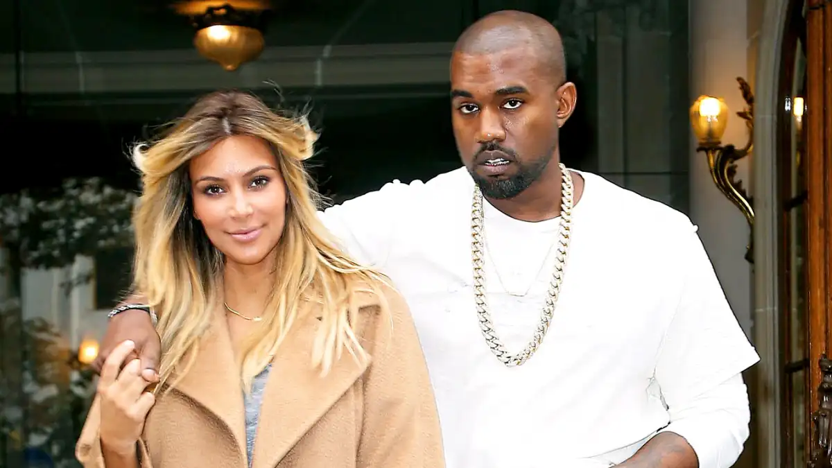 Kim Kardashian and Kanye West are seen on the 'Avenue Montaigne' on September 28, 2013 in Paris, France.