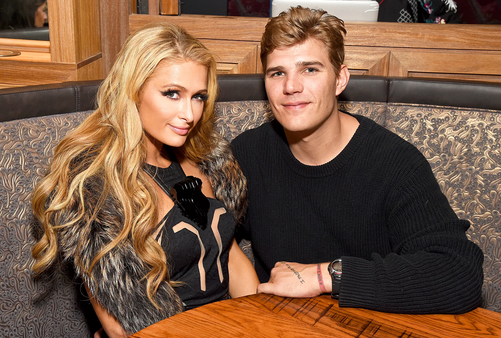 Paris Hilton and Chris Zylka attend day three of TAO, Beauty & Essex, Avenue and Luchini LA Grand Opening on March 18, 2017 in Los Angeles, California.