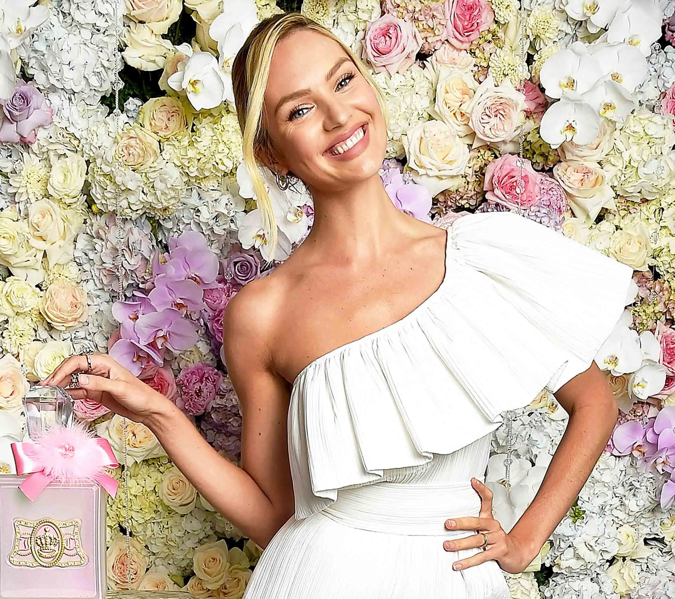 Candice Swanepoel launches Viva La Juicy Glace fragrance at The Edition Hotel in July 2017 in New York City.