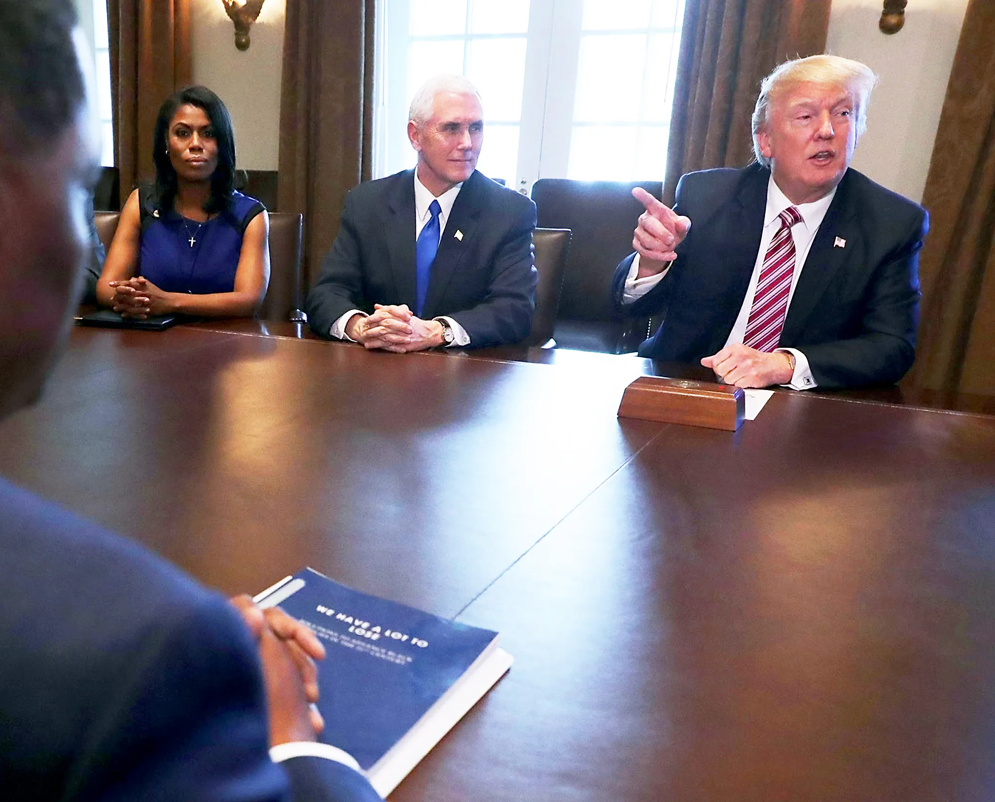 Omarosa Manigault, Mike Pence and Donald Trump during a meeting with the Congressional Black Caucus Executive Committee in the Cabinet Room at the White House March 22, 2017 in Washington, DC.