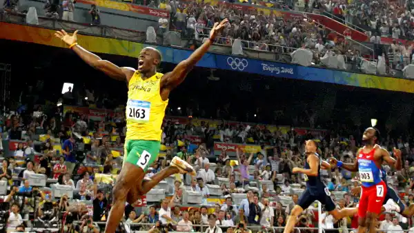 Jamaica's Usain Bolt celebrates winning the men's 200m final at the National stadium as part of the 2008 Beijing Olympic Games on August 20, 2008.
