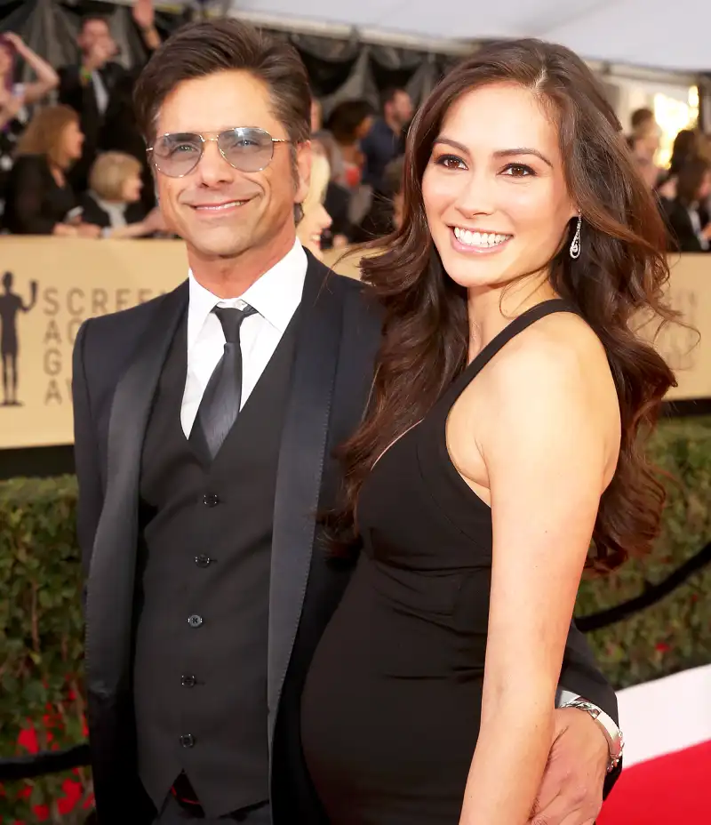 John Stamos and Caitlin McHugh attend the 24th Annual Screen Actors Guild Awards at The Shrine Auditorium in Los Angeles, California.