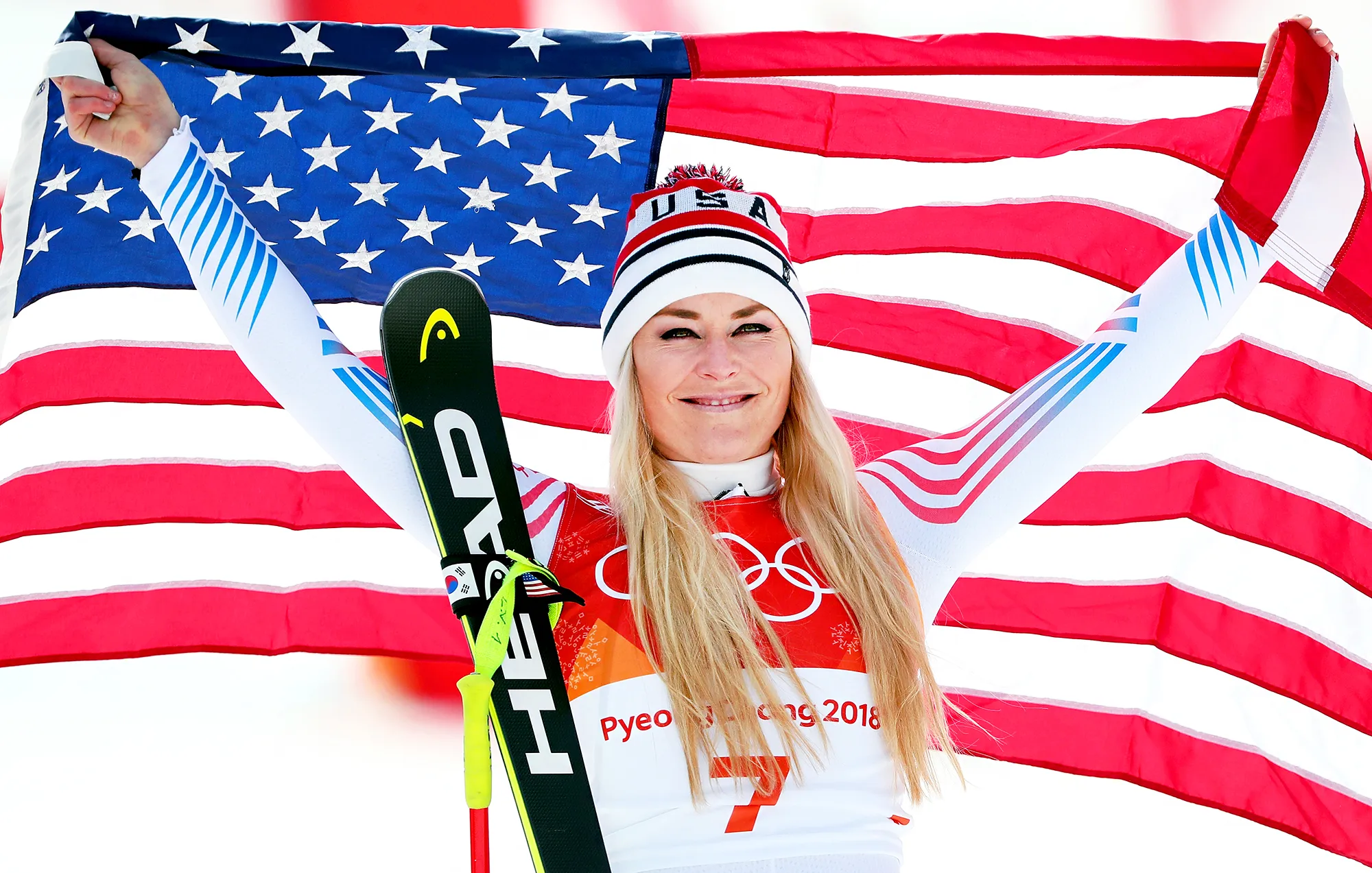 Bronze medallist Lindsey Vonn of the United States celebrates during the victory ceremony for the Ladies' Downhill on day 12 of the PyeongChang 2018 Winter Olympic Games at Jeongseon Alpine Centre on February 21, 2018 in Pyeongchang-gun, South Korea.