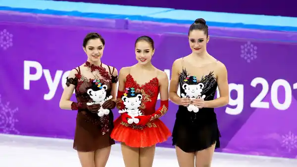 Silver medalist Evgenia Medvedeva of Olympic Athlete from Russia, gold medalist Alina Zagitova of Olympic Athlete from Russia, bronze medalist Kaetlyn Osmond of Canada during the venue victory ceremony following the Figure Skating Ladies Free program on day fourteen of the PyeongChang 2018 Winter Olympic Games at Gangneung Ice Arena on February 23, 2018 in Gangneung, South Korea.