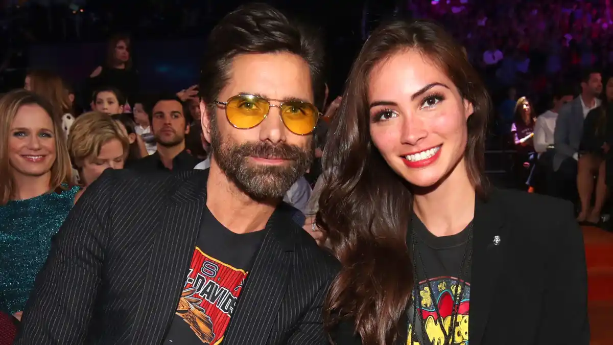 John Stamos and Caitlin McHugh