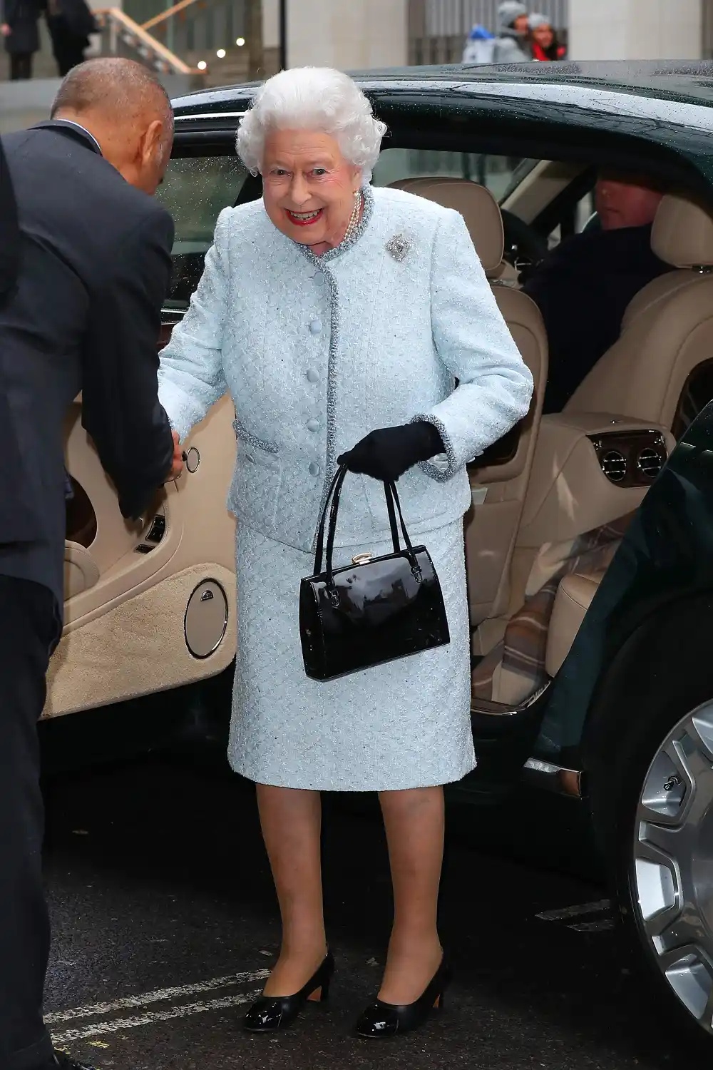 Queen Elizabeth II attends the Richard Quinn show