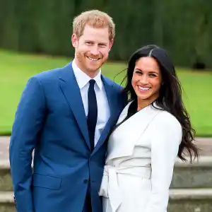 Prince Harry and Meghan Markle during an official photocall to announce their engagement at The Sunken Gardens at Kensington Palace on November 27, 2017 in London, England.