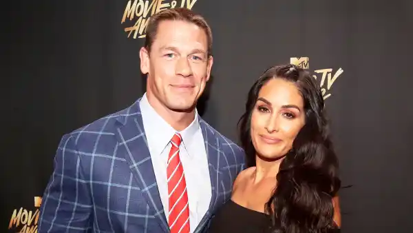 John Cena and Nikki Bella attend the 2017 MTV Movie And TV Awards at The Shrine Auditorium in Los Angeles, California.