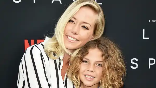 Kendra Wilkinson and son Hank Baskett IV attend the "Lost In Space" Season 1 Premiere at ArcLight Cinerama Dome on April 9, 2018 in Hollywood, California.