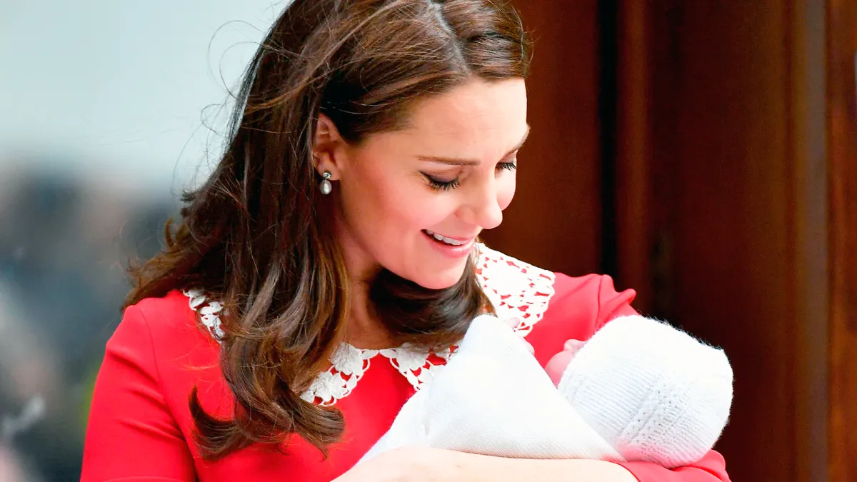 Kate Middleton looks at Prince Louis of Cambridge on the steps of the Lindo Wing at St Mary's Hospital in London, England on April 23, 2018.