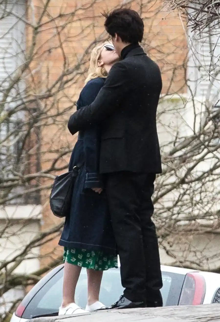 Lili-Reinhart-and-Cole-Sprouse-Share-a-Kiss-in-Paris