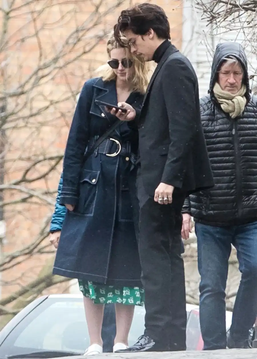 Lili-Reinhart-and-Cole-Sprouse-Share-a-Kiss-in-Paris