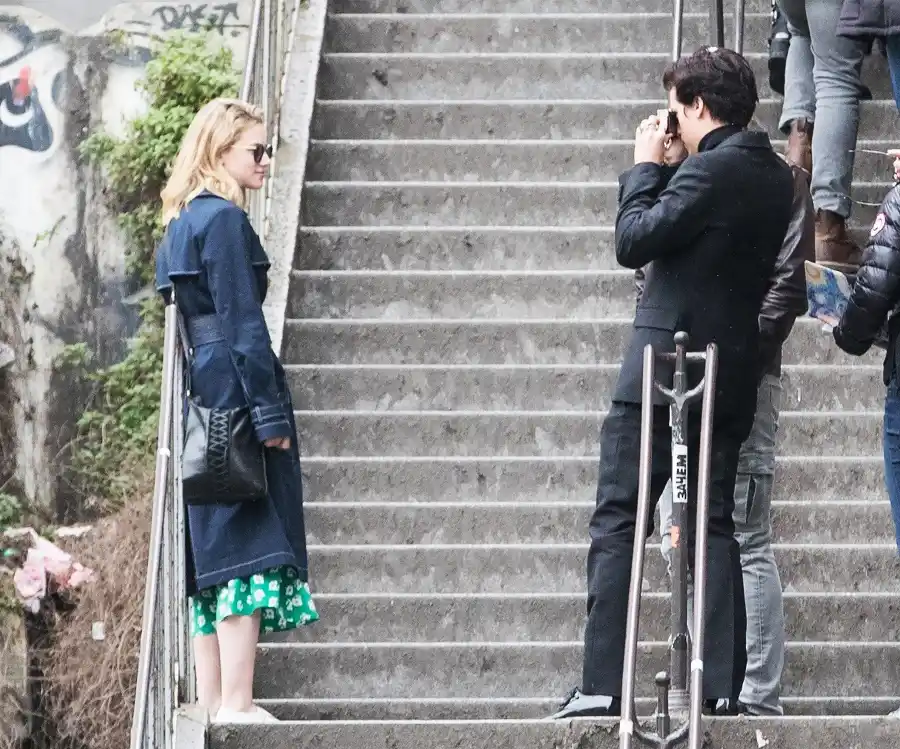 Lili-Reinhart-and-Cole-Sprouse-Share-a-Kiss-in-Paris