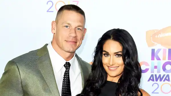 John Cena and Nikki Bella arrive at the Nickelodeon's 2017 Kids' Choice Awards at USC Galen Center on March 11, 2017 in Los Angeles, California.