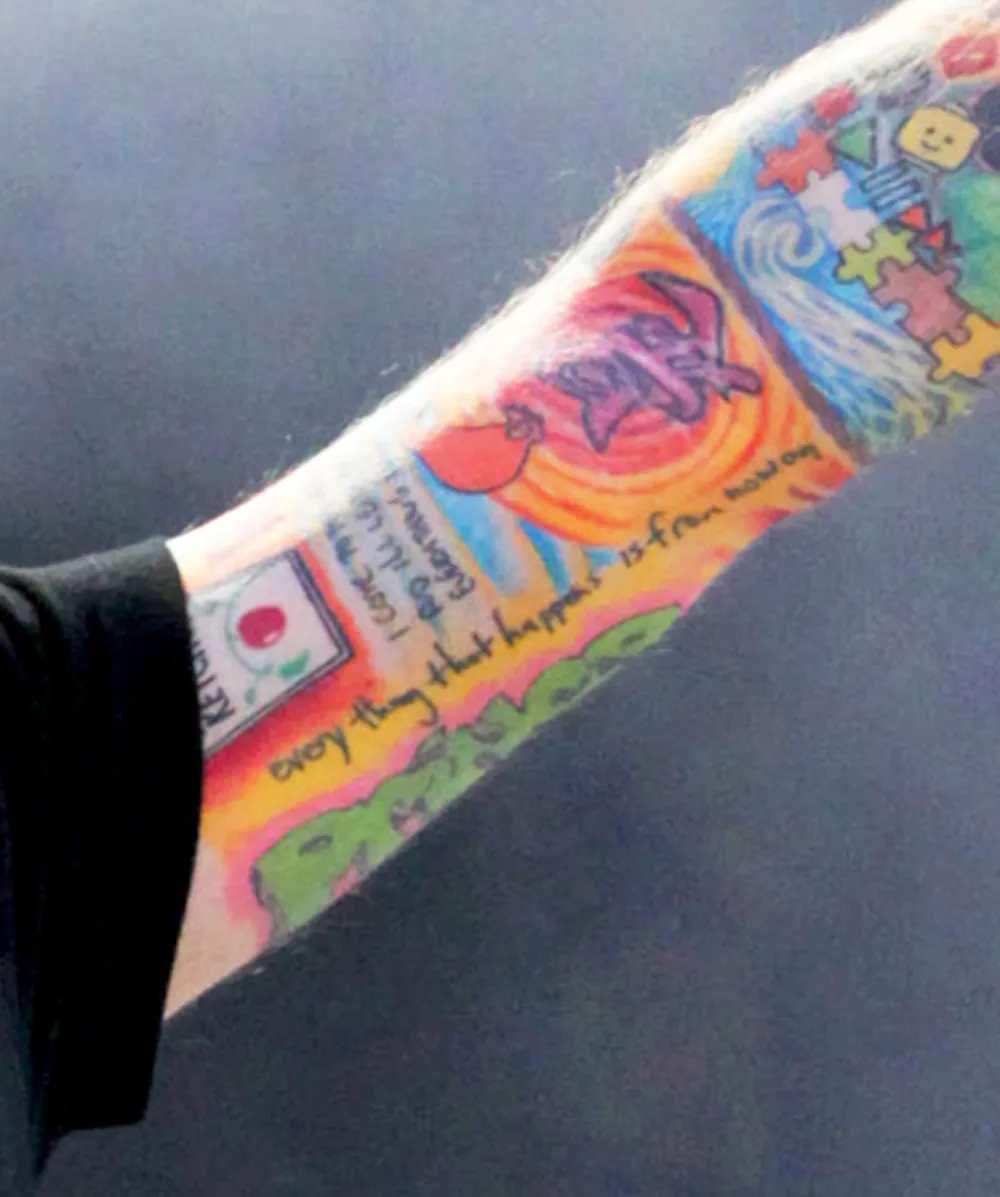 Ed Sheeran&rsquo;s arm of tattoos while her performs at 2014 Pinkpop at Megaland in Landgraaf, Netherlands.