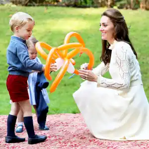 Kate Middleton with Princess Charlotte and Prince George at a children's party for Military families during the 2016 Royal Tour of Canada in Victoria, Canada.
