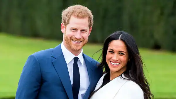 Prince Harry and Meghan Markle during an official photocall to announce their engagement at The Sunken Gardens at Kensington Palace on November 27, 2017 in London, England.