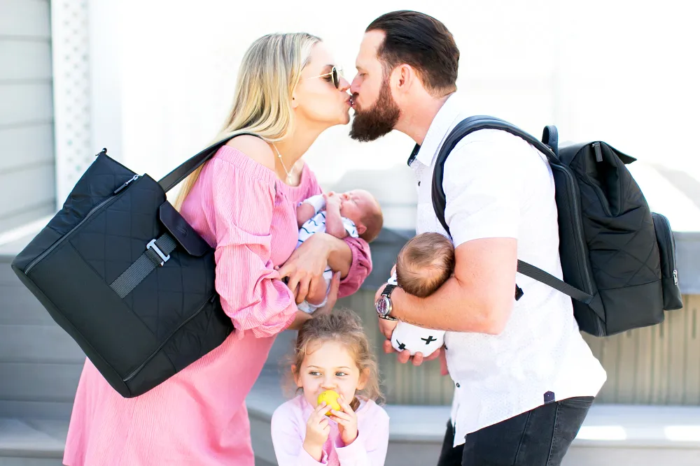 A.J. Buckley and Abigail Ochse with daughter Willow and twins Bodhi and Ranger