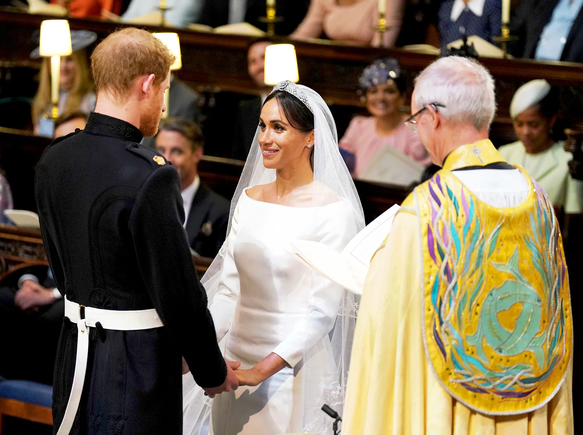 Prince Harry and Meghan Markle exchange vows during their wedding ceremony in St. George's Chapel at Windsor Castle on May 19, 2018 in Windsor, England.