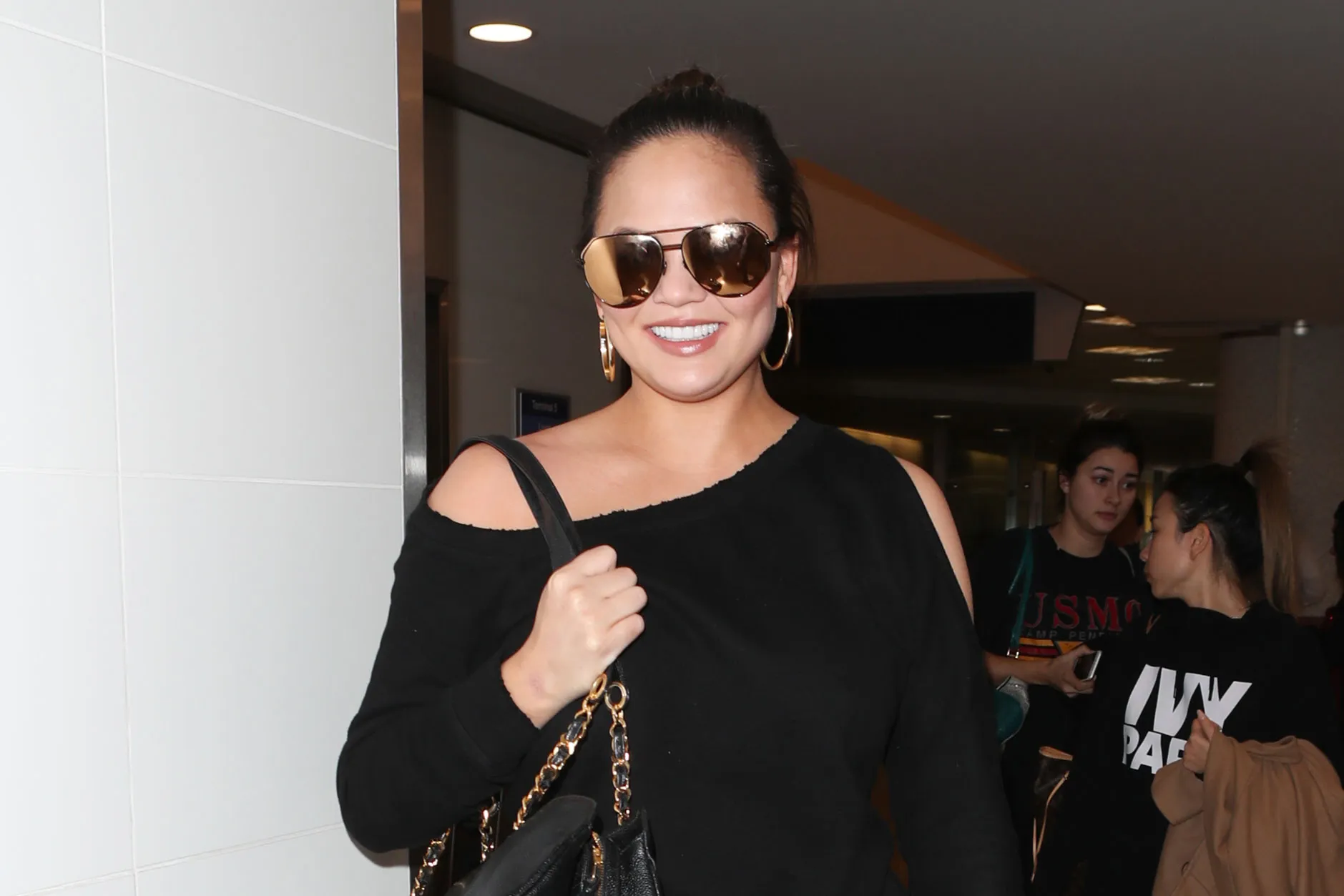 Chrissy Teigen Leaving Airport