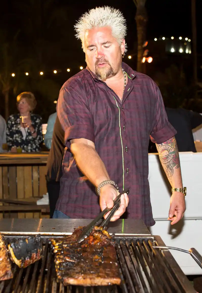 Guy Fieri grilling at the 2016 Food Network & Cooking Channel South Beach Wine & Food Festival Presented By FOOD & WINE at Surfcomber Hotel in Miami Beach, Florida.