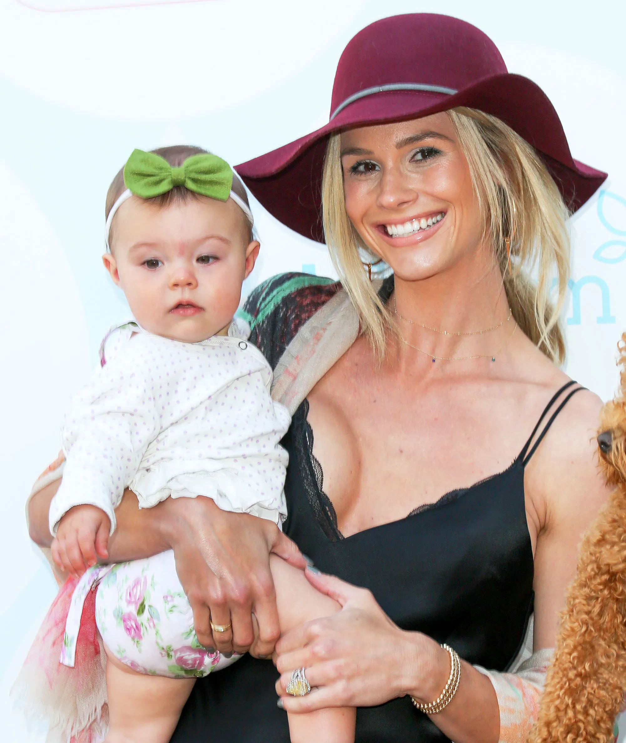 Meghan King Edmonds and her daughter Aspen attends the 6th Annual Celebrity Red CARpet Safety Awareness event at Sony Studios Commissary in Culver City, California.