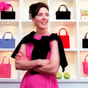 Kate Spade poses in her handbag store on Newbury Street in Boston.