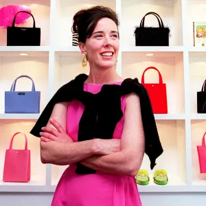 Kate Spade poses in her handbag store on Newbury Street in Boston.