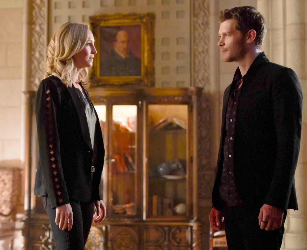 Candice King as Caroline and Joseph Morgan as Klaus on The Originals