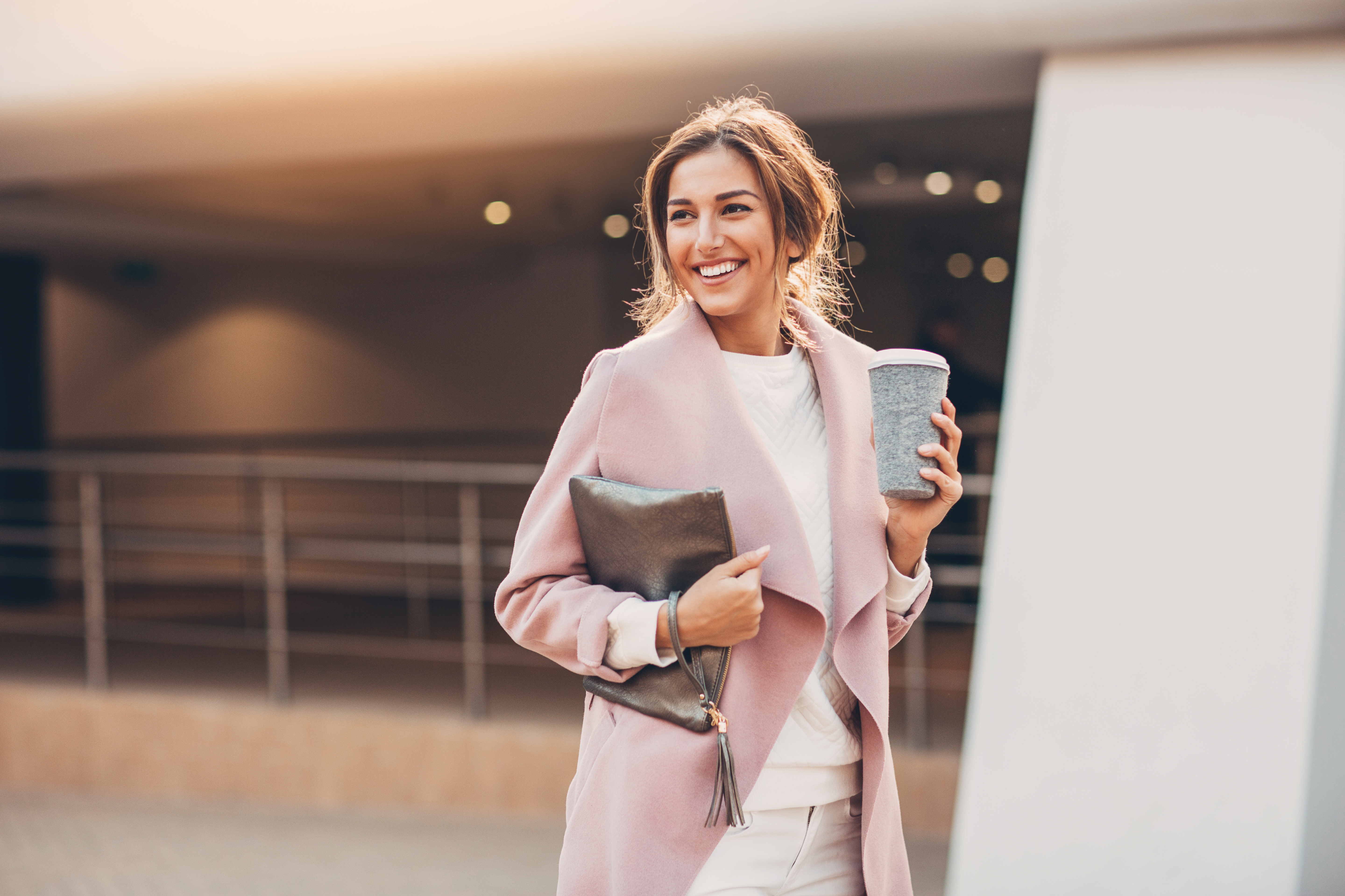 woman holding clutch