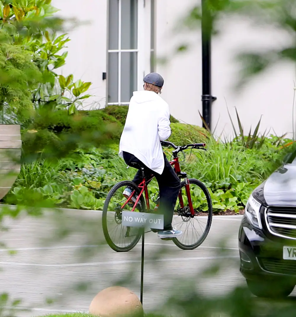 Brad Pitt goes for a bike ride in the U.K. on June 13, 2018.