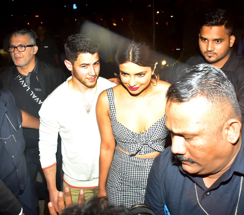 Nick Jonas and Priyanka Chopra walking through the streets of Mumbai on June 22, 2018.
