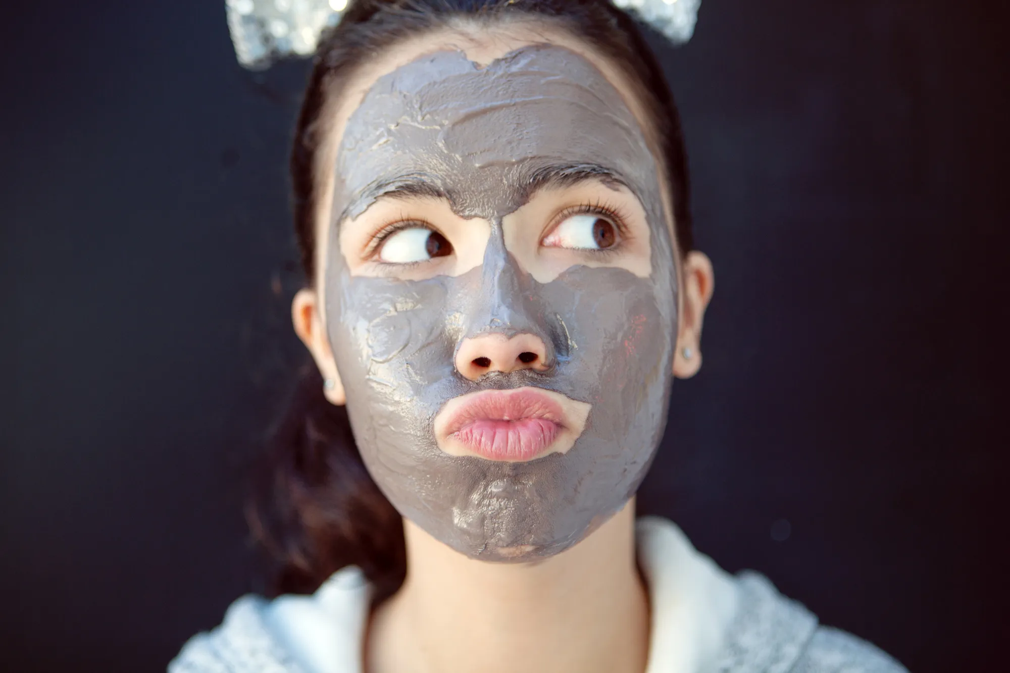 teen with chocolate facial beauty mask