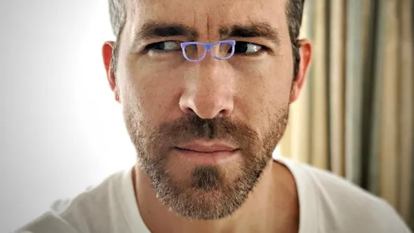 Ryan Reynolds tiny glasses