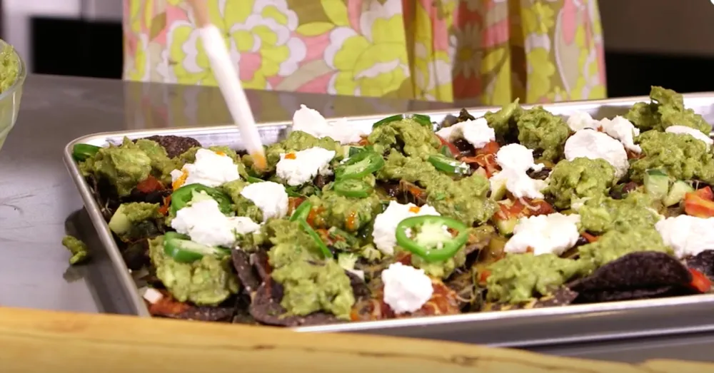 Go Inside OITNB&rsquo;s Alysia Reiner&rsquo;s Kitchen for Healthy-ish Nachos &ndash; Watch