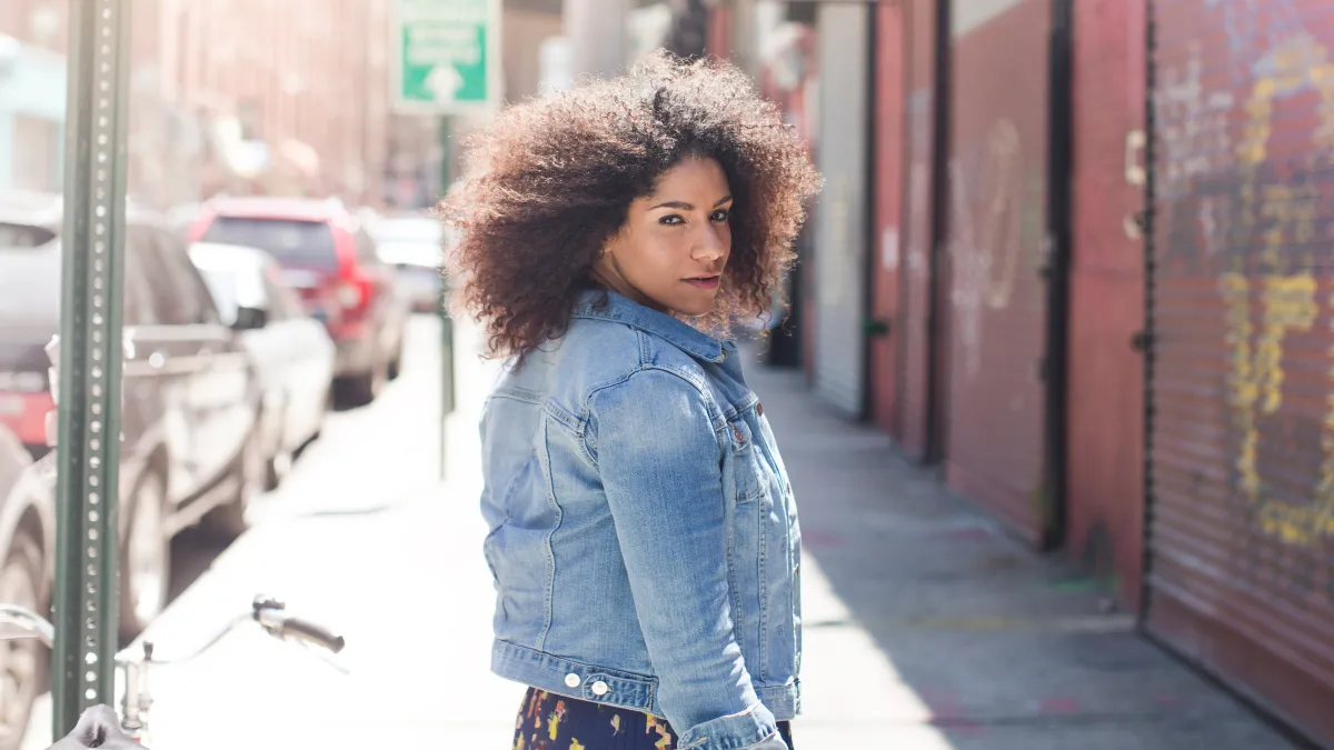 woman in denim jacket