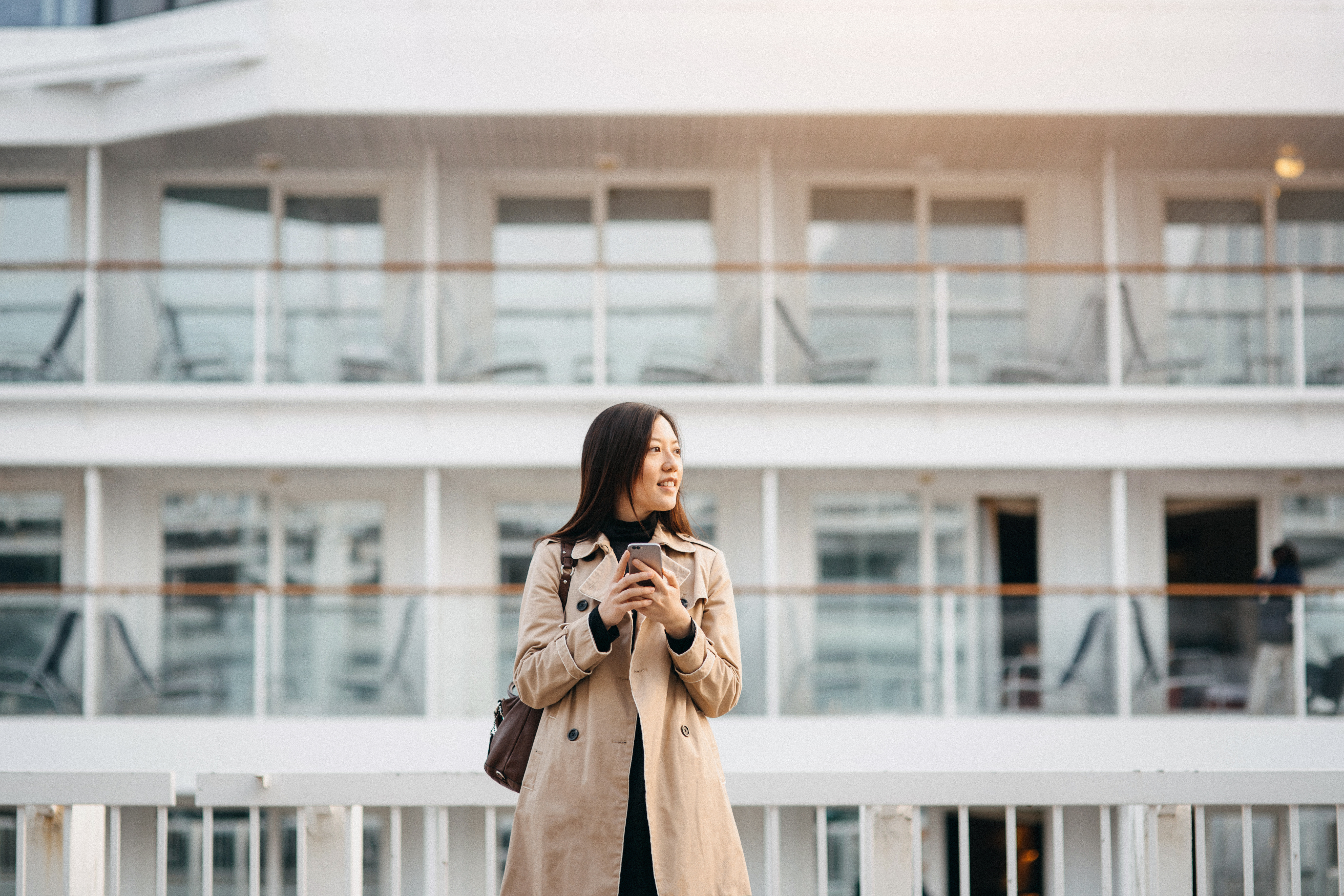 woman in trench coat