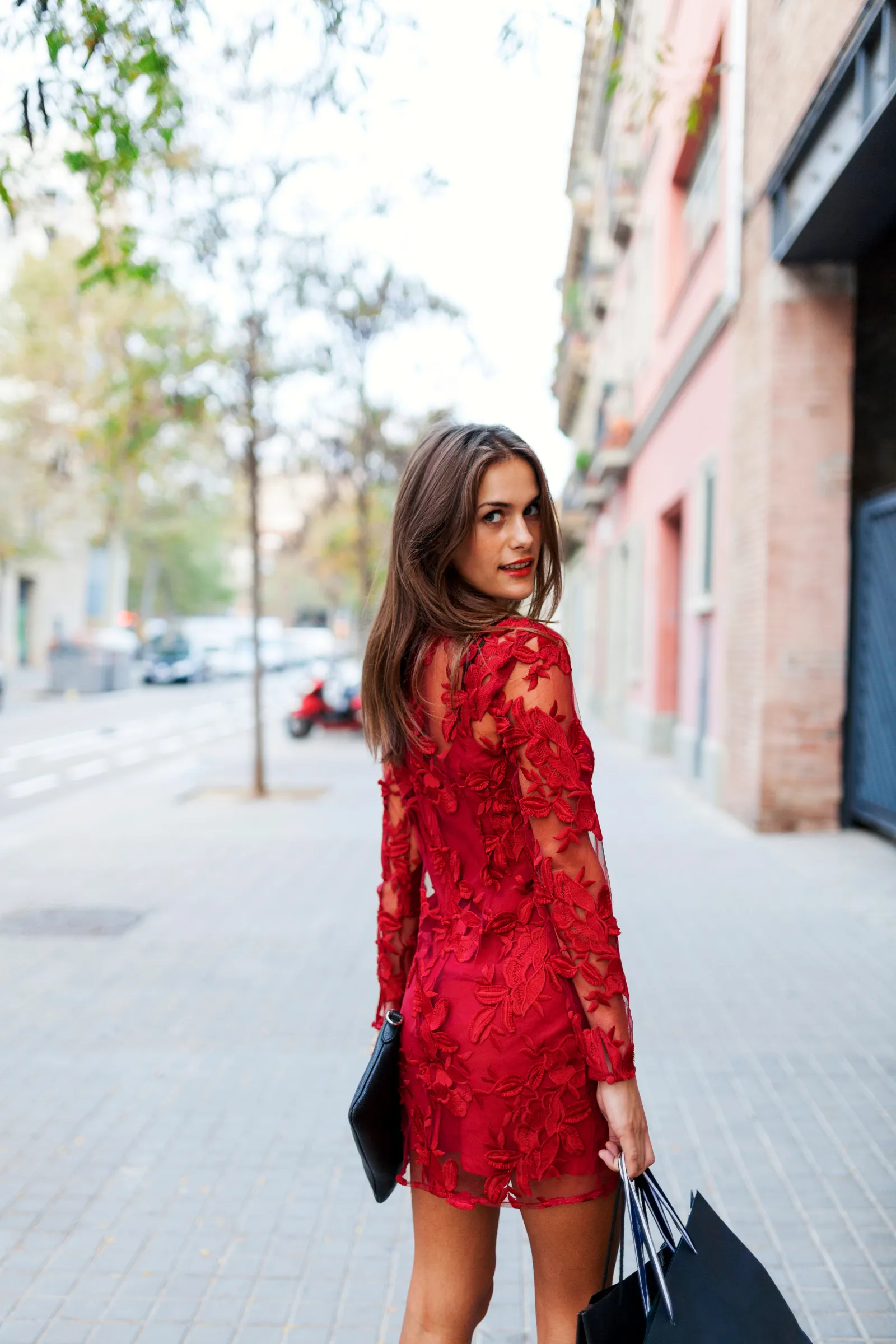 woman in red lace dress