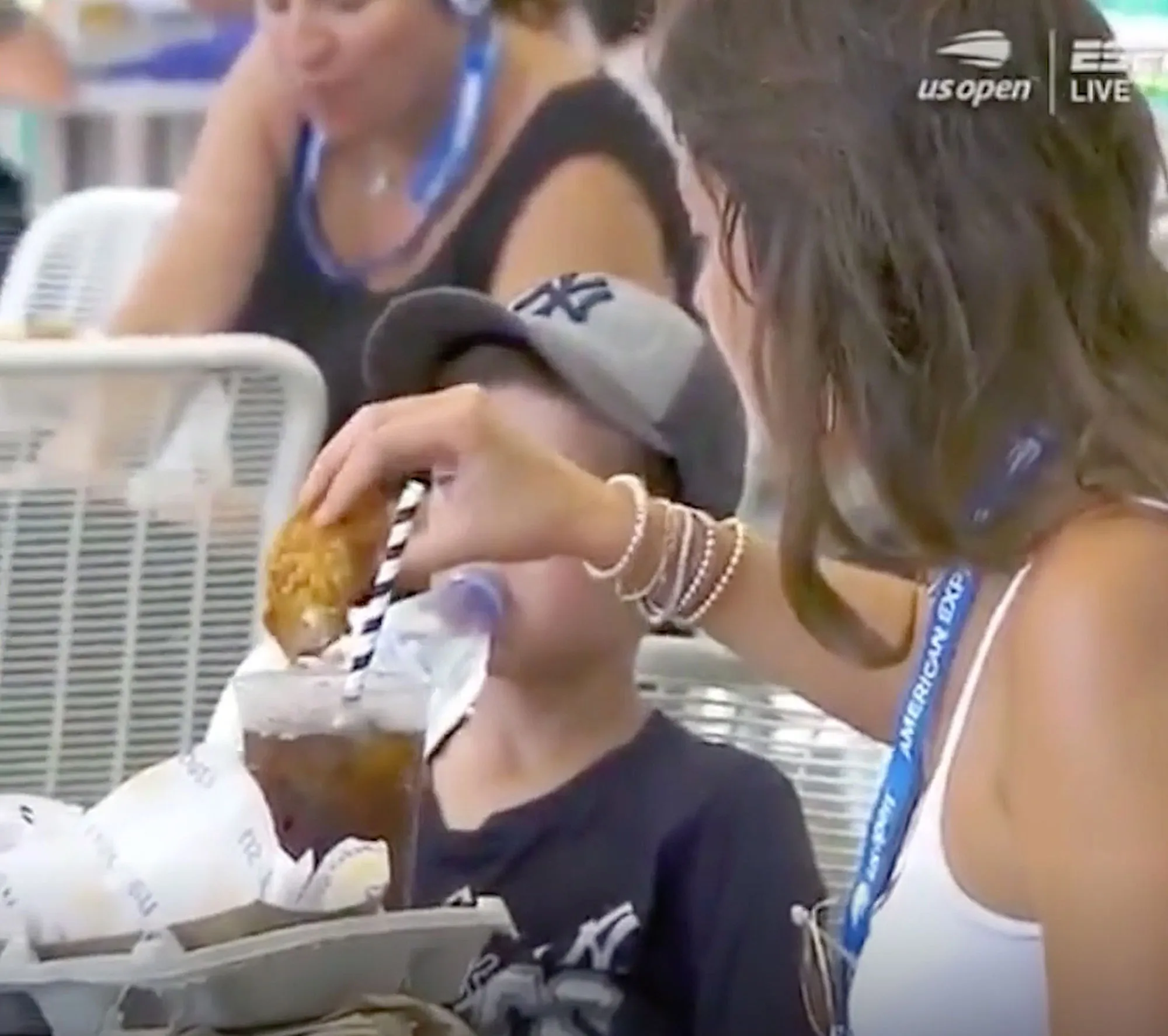 Woman Dips Chicken Tender in Soda