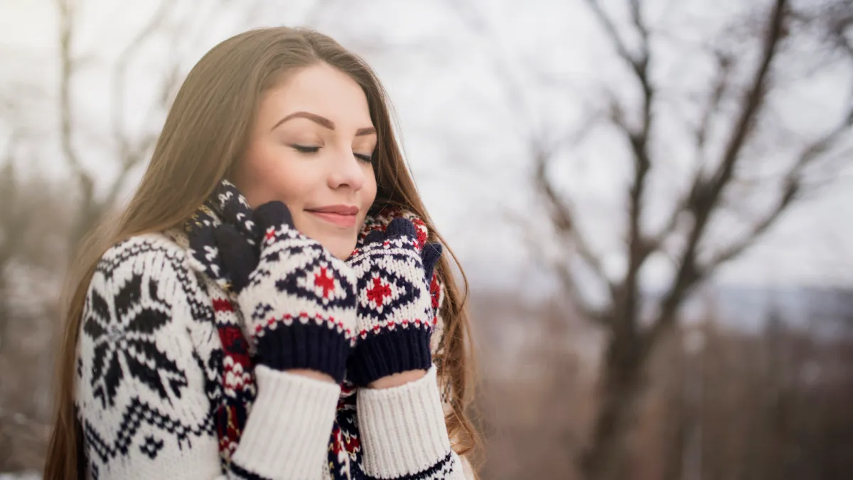 Young woman wearing sweater