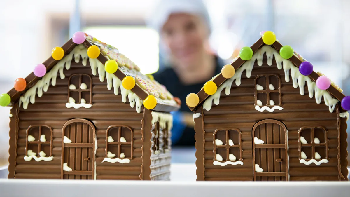 Close up of chocolate houses made in sweet factory