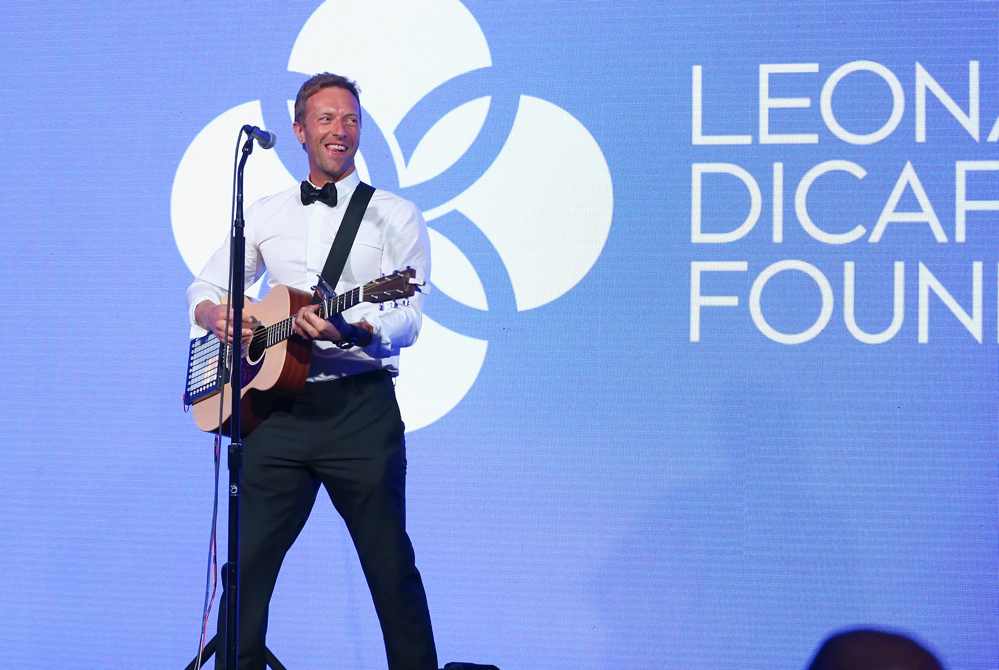 Chris Martin performs onstage at the Leonardo DiCaprio Foundation Gala