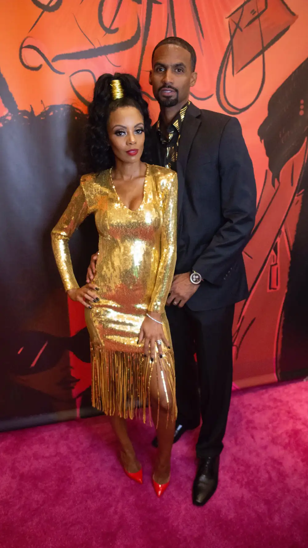 Monique Rodriguez and husband Melvin Rodriguez of Mielle Organics took a break after delivering a fabulous show of unity at Texture On The Runway during NYFW.