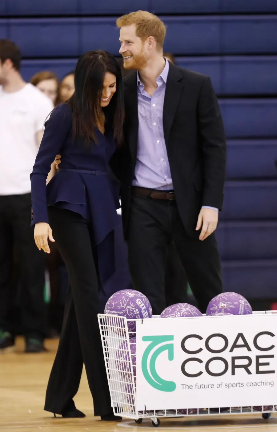 Megan Markle Plays Basketball in Oscar De La Renta and Heels at Royal Function With Prince Harry
