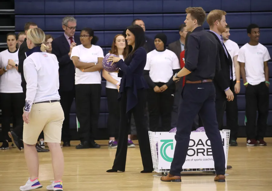Megan Markle Plays Basketball in Oscar De La Renta and Heels at Royal Function With Prince Harry