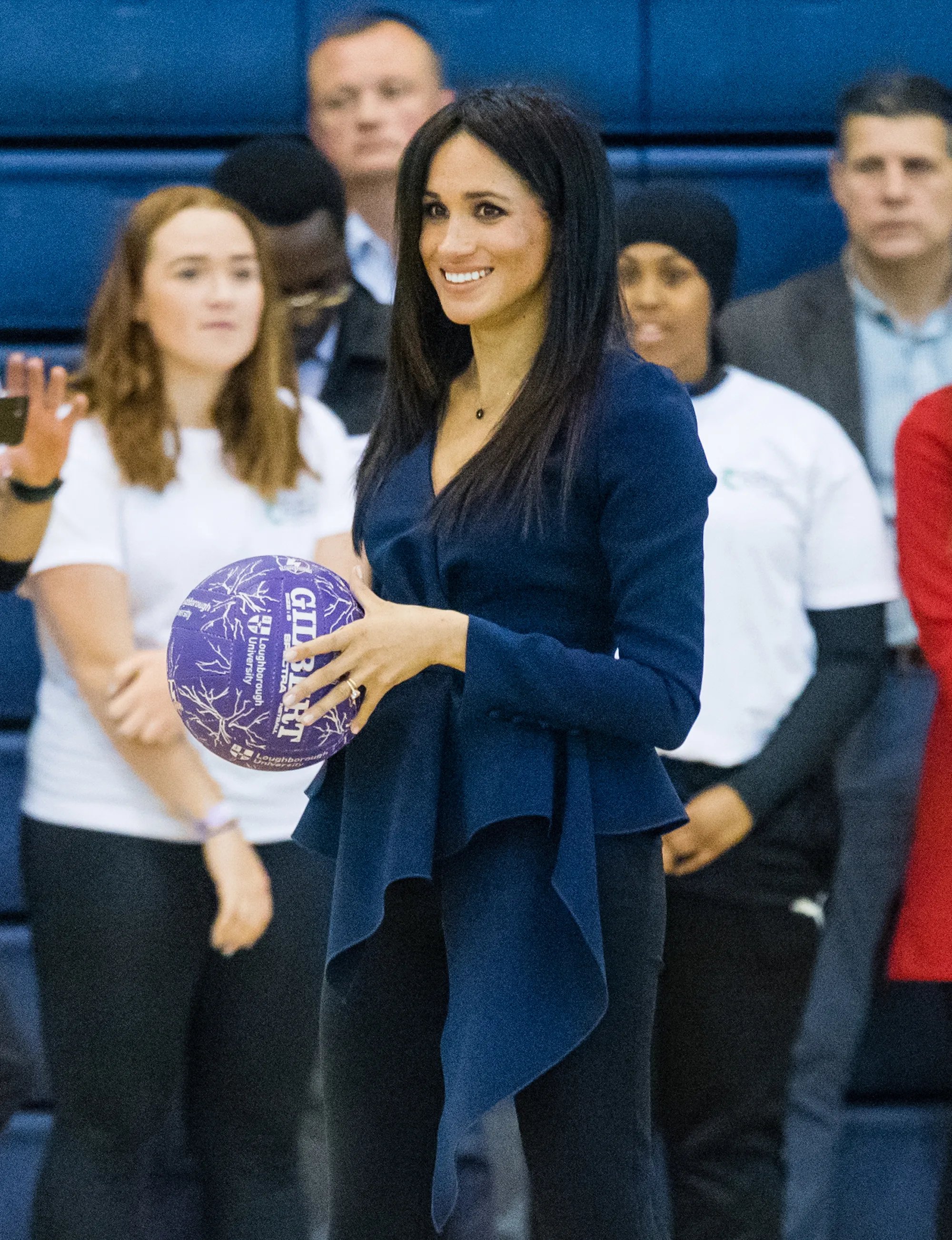 Megan Markle Plays Basketball in Oscar De La Renta and Heels at Royal Function With Prince Harry