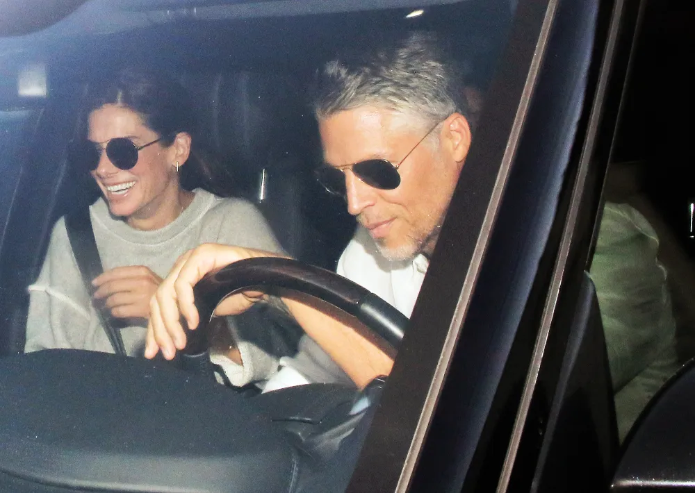 Sandra Bullock Leaning On Bryan Randall